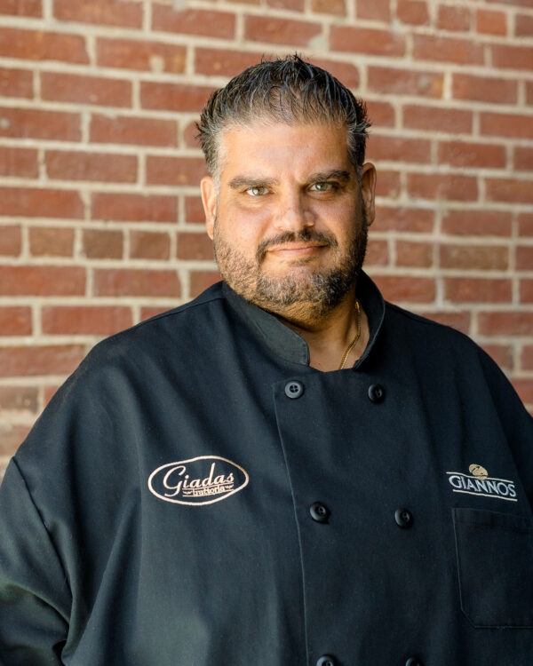 Chef Dave preparing wood-fired food